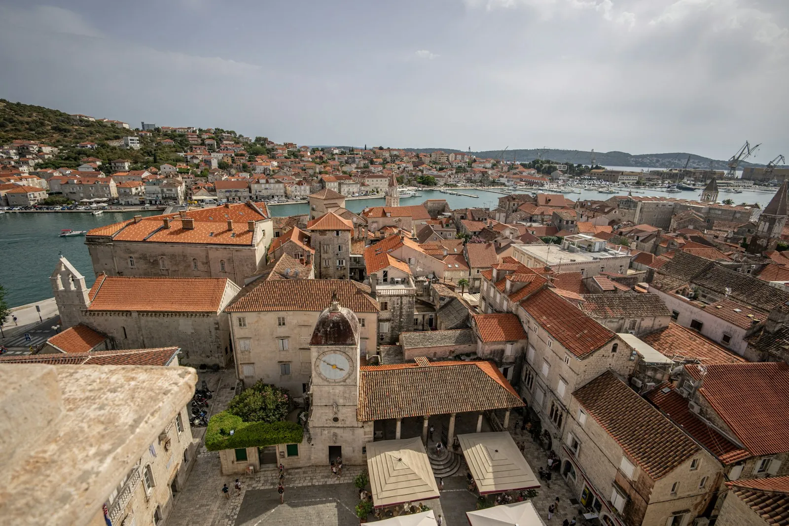 split-croatia-trogir-church-clock Bird view of Old town Trogir with churches and sea near Split in Croatia