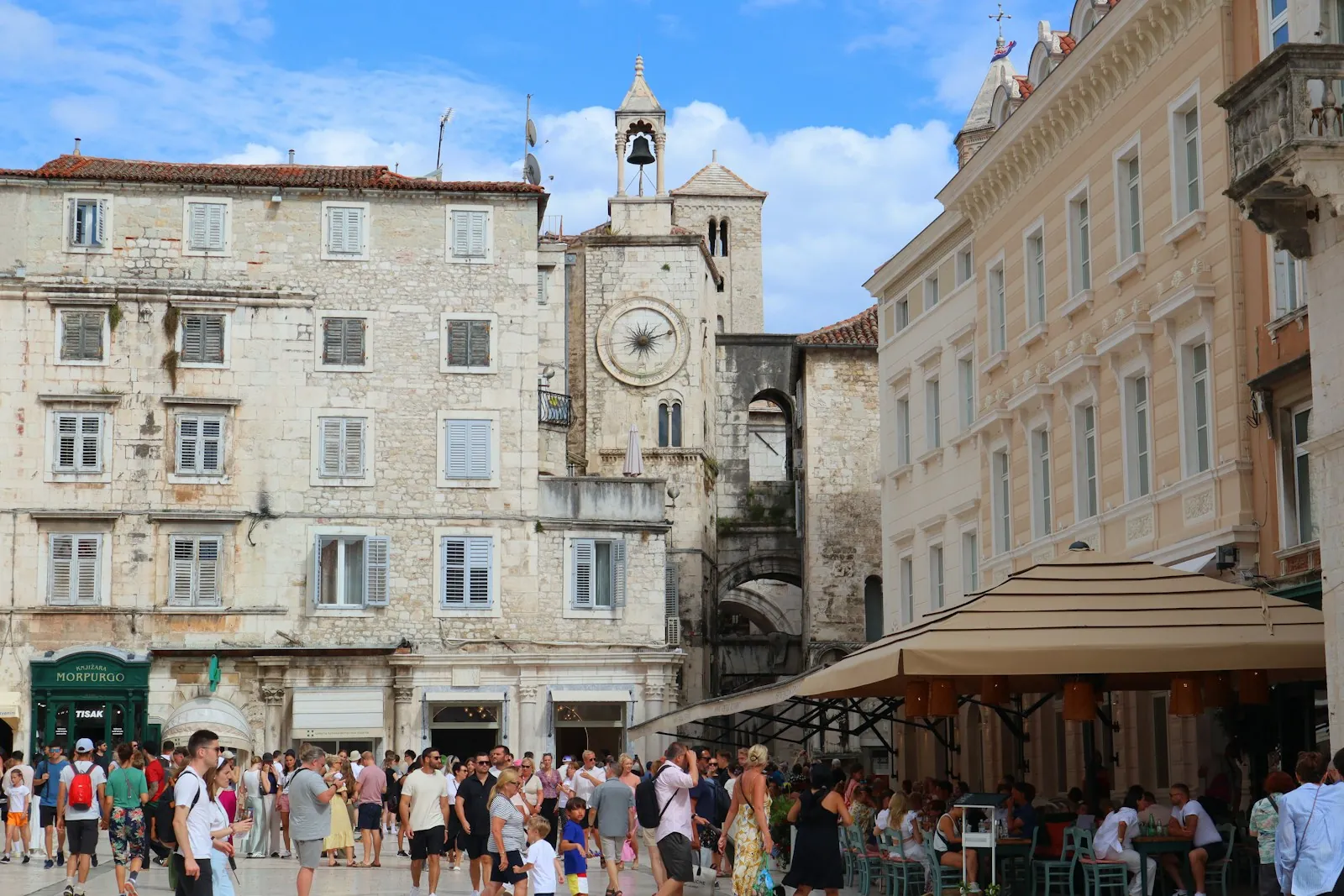 split-main-square-pjaca-croatia People walking around Pjaca square in Old town Split Croatia