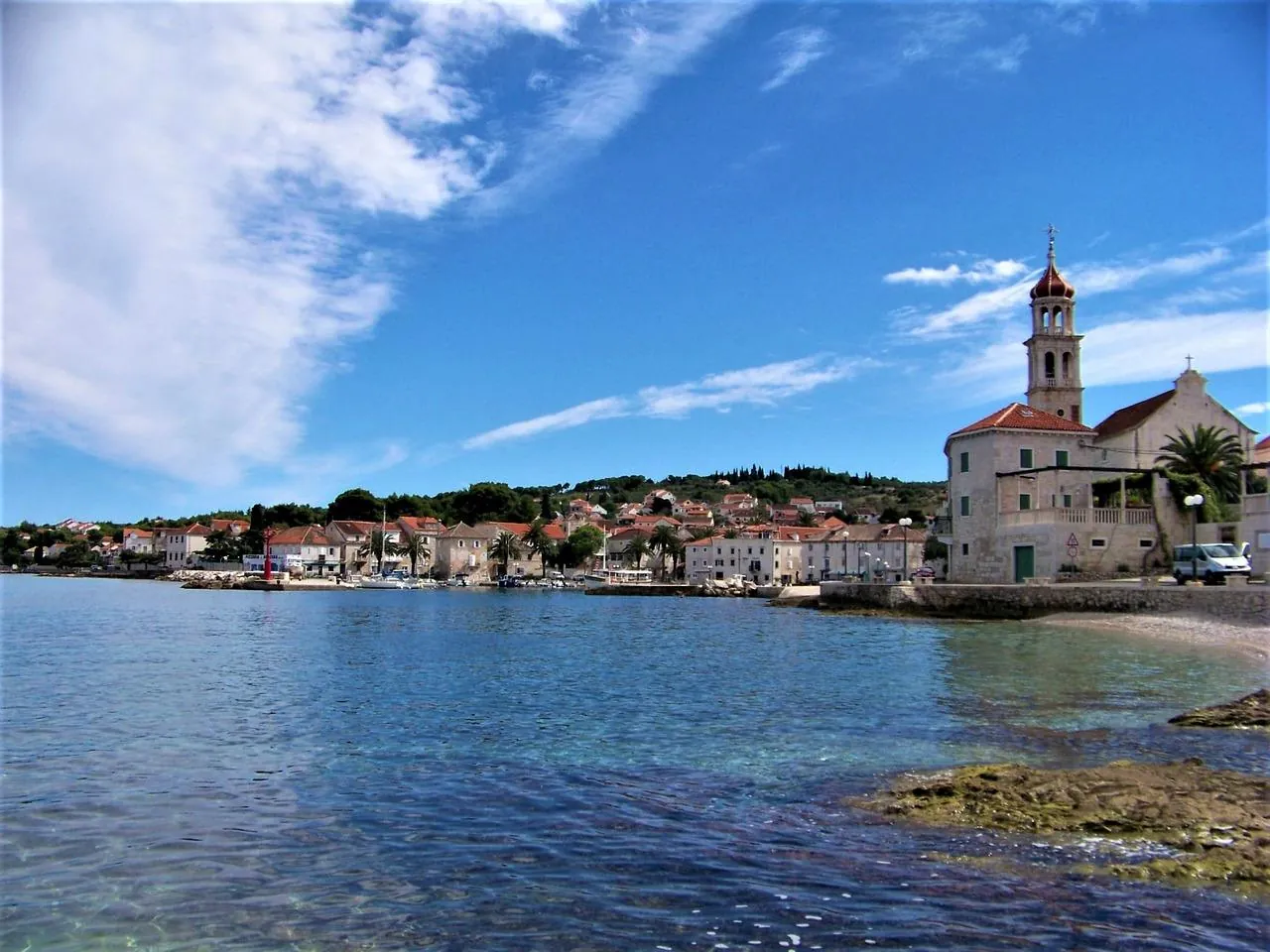 brac-island-sutivan-village-croatia Sutivan village on Brač island, Croatia, with traditional stone houses and calm seaside