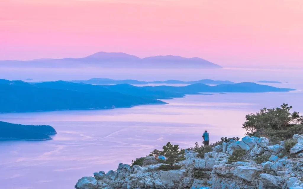 View over the Croatian islands in the Adriatic Sea at sunset, seen from a coastal viewpoint