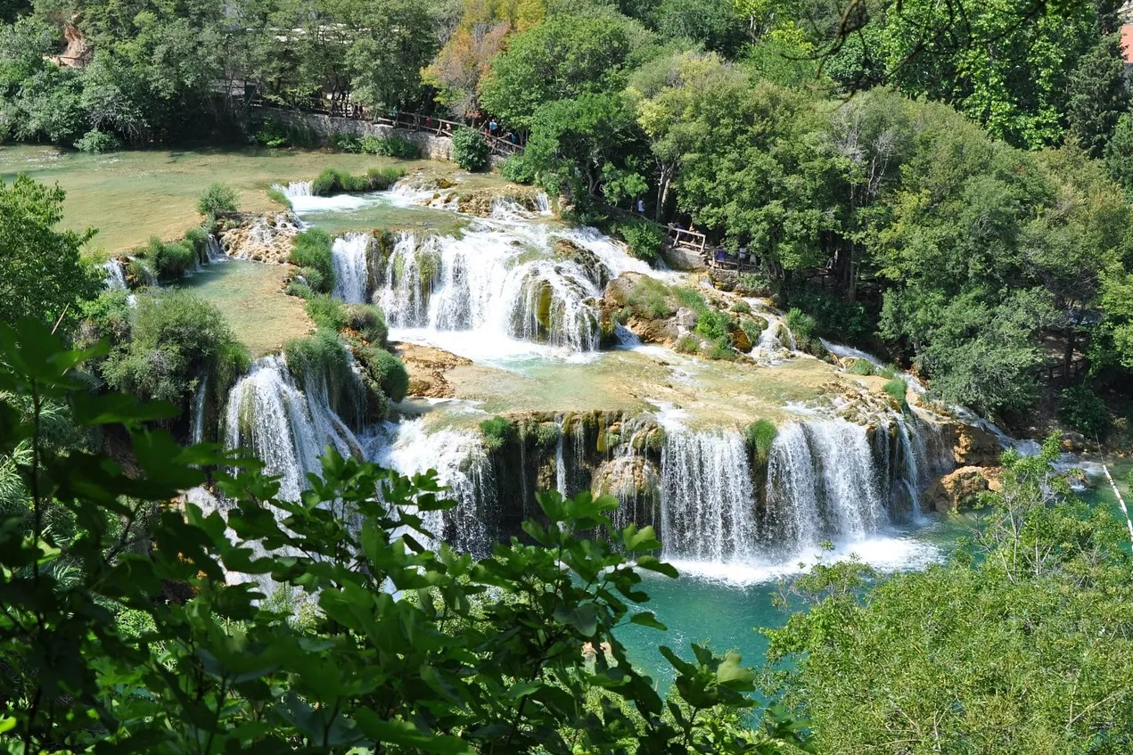 krka-national-park-waterfalls Waterfalls surrounded by lush greenery in Krka National Park, Croatia
