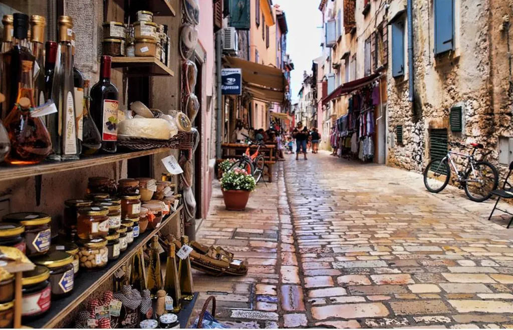 summer-heat-croatia-old-town-street-rovinj Narrow old town street in Croatia town Rovinj during a hot summer day