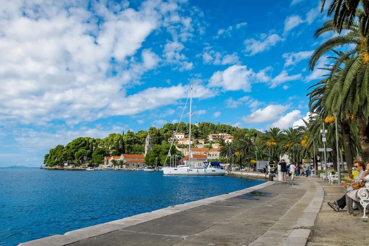 cavtat-dubrovnik-croatia-promenade-in-summer Seafront promenade in Cavtat near Dubrovnik with palm trees and boats