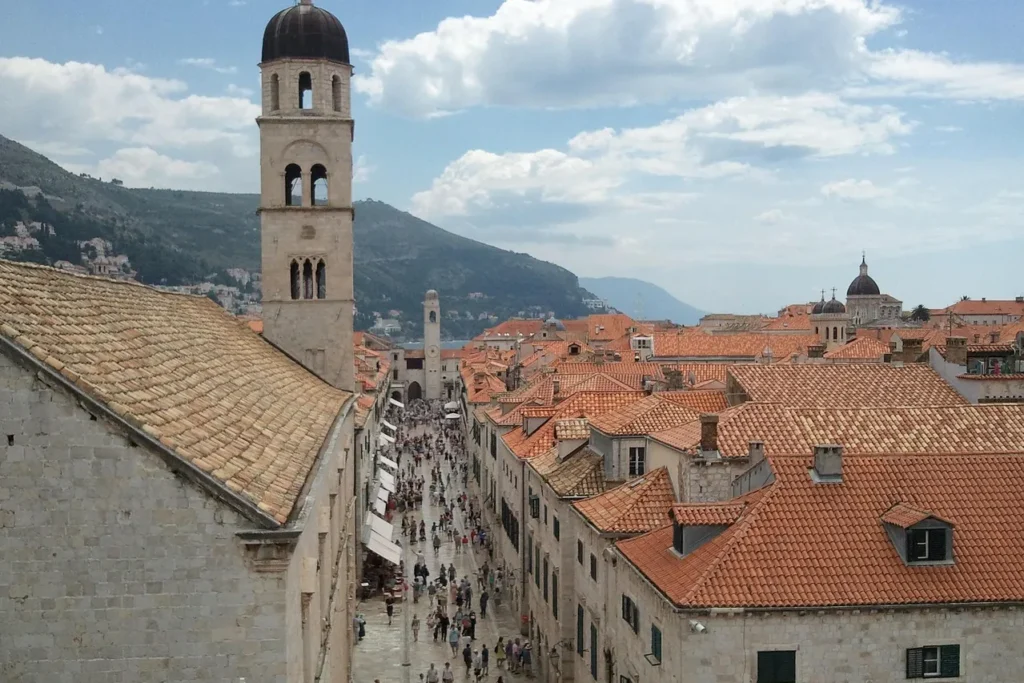 People walking along Stradun in Dubrovnik’s old town in the early season