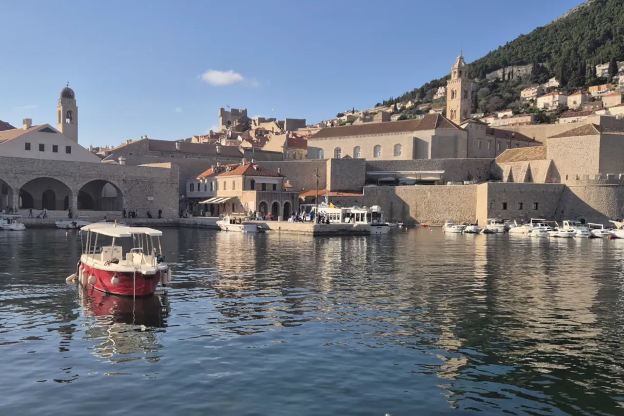 dubrovnik-old-port-harbour-boarding-lokrum Dubrovnik Old Port with boats and harbour inside the Old Town walls