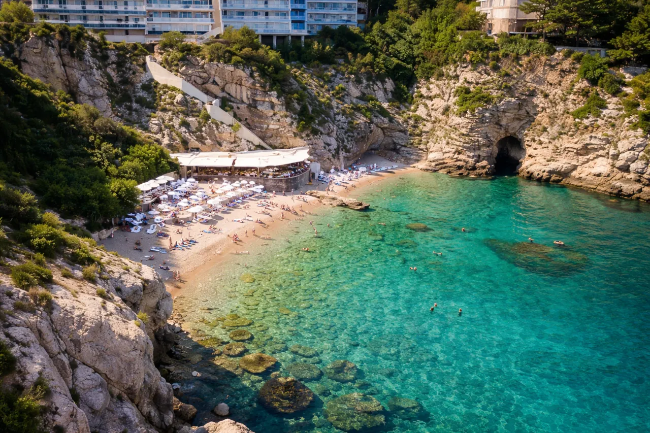 bellevue-beach-dubrovnik-croatia-near-old-town Bellevue Beach Dubrovnik Croatia aerial view with turquoise water and distant swimmers