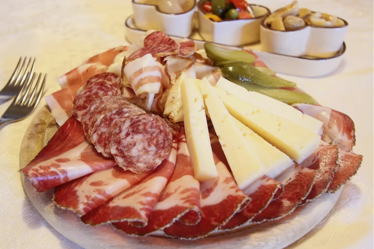 dalmatian-cold-platter-prsut-cheese-salami Traditional Dalmatian cold plate with prosciutto, cheese and cured meats