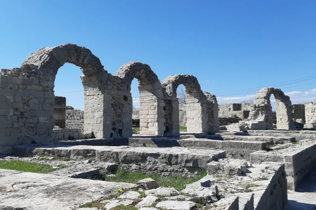 Roman ruins and stone arches in Salona Croatia, the ancient capital of Dalmatia near Split