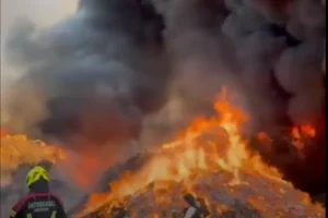 Firefighter battling a wildfire near Split at the Prapatnica waste disposal site