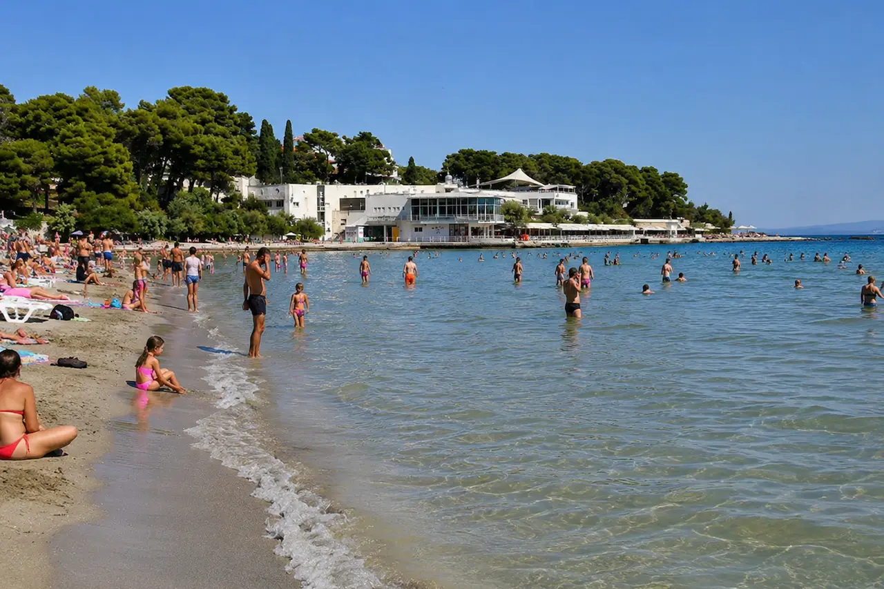 Swimmers in the shallow water at Bačvice Beach in Split, Croatia